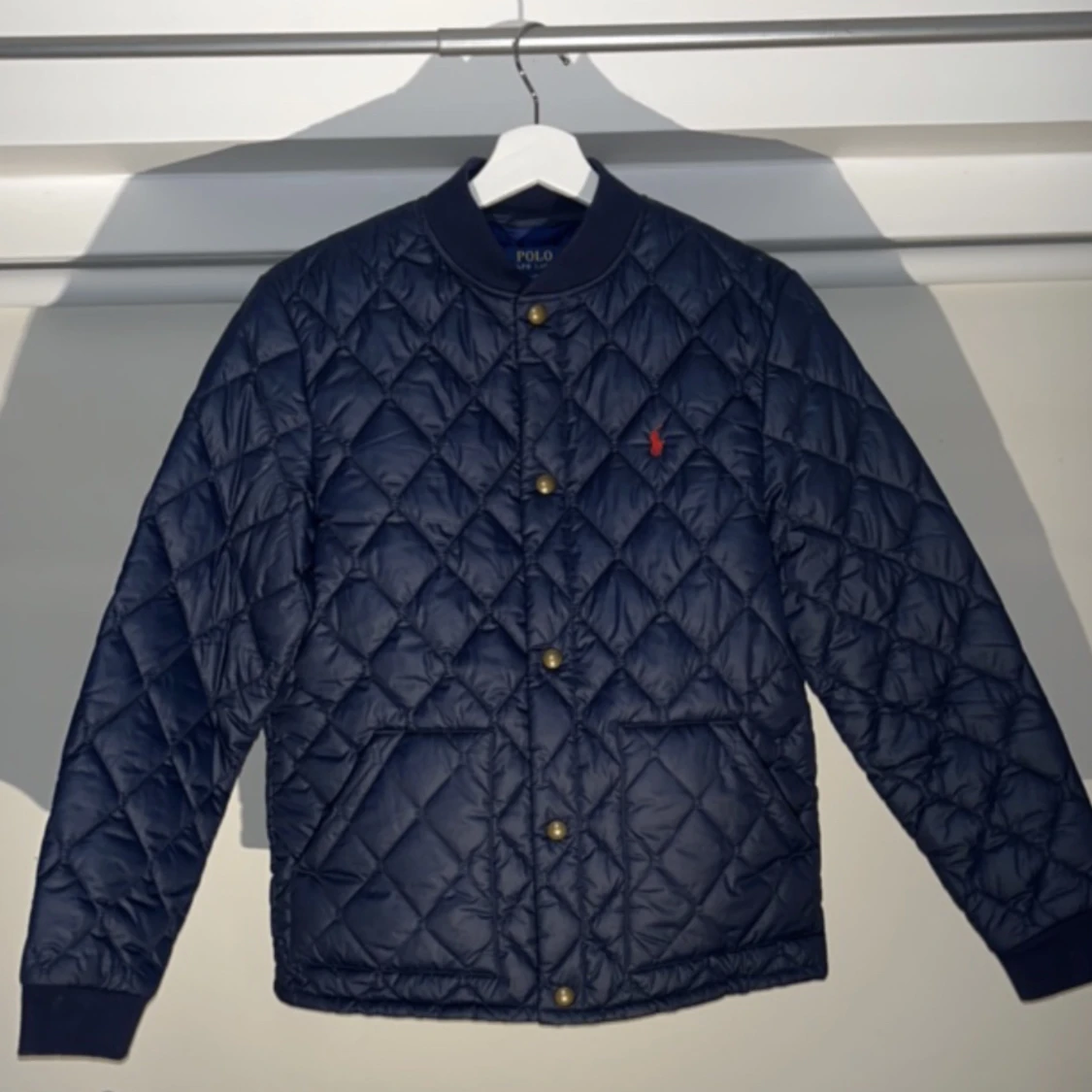 En Ralph lauren jacka// blå och rött märke