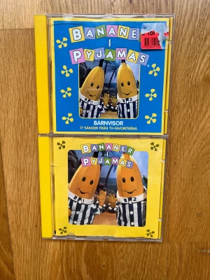 Paketpris Bananer i Pyjamas CD-skivor - Bananer i pyjamas cd-skivor. Riktigt gamla men kul för den nostalgiska eller till ett barn. Vet inte hur användande jag haft dem sedan jag själv var liten men kan testa de innan köp om så önskas! 