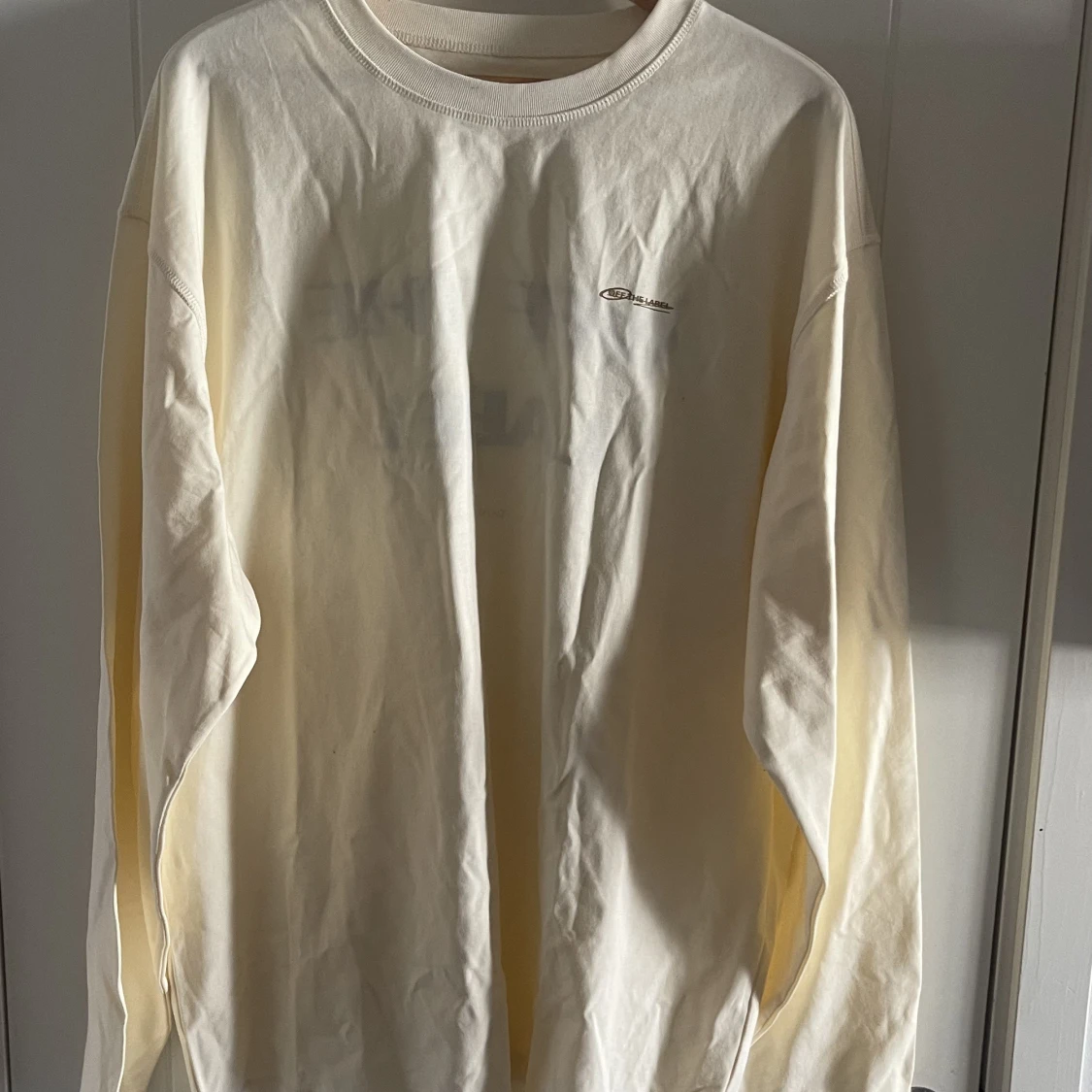 Off the label tröja