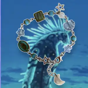 Armband inspirerad av Ghibli filmen Mononoke med tjeckiska pärlor, en måne av snäckskal och stjärnberlock✨🌙💙