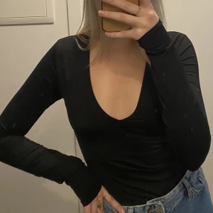 Oanvänd topp - Oanvänd body/topp! Perfekt skick. Mjukt material och dubbelt tyg vid bysten