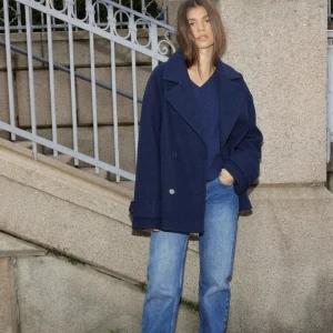 Kappa - En kappa i en superfin marinblå färg som tyvärr inte kommer till använding, köpt för 699kr