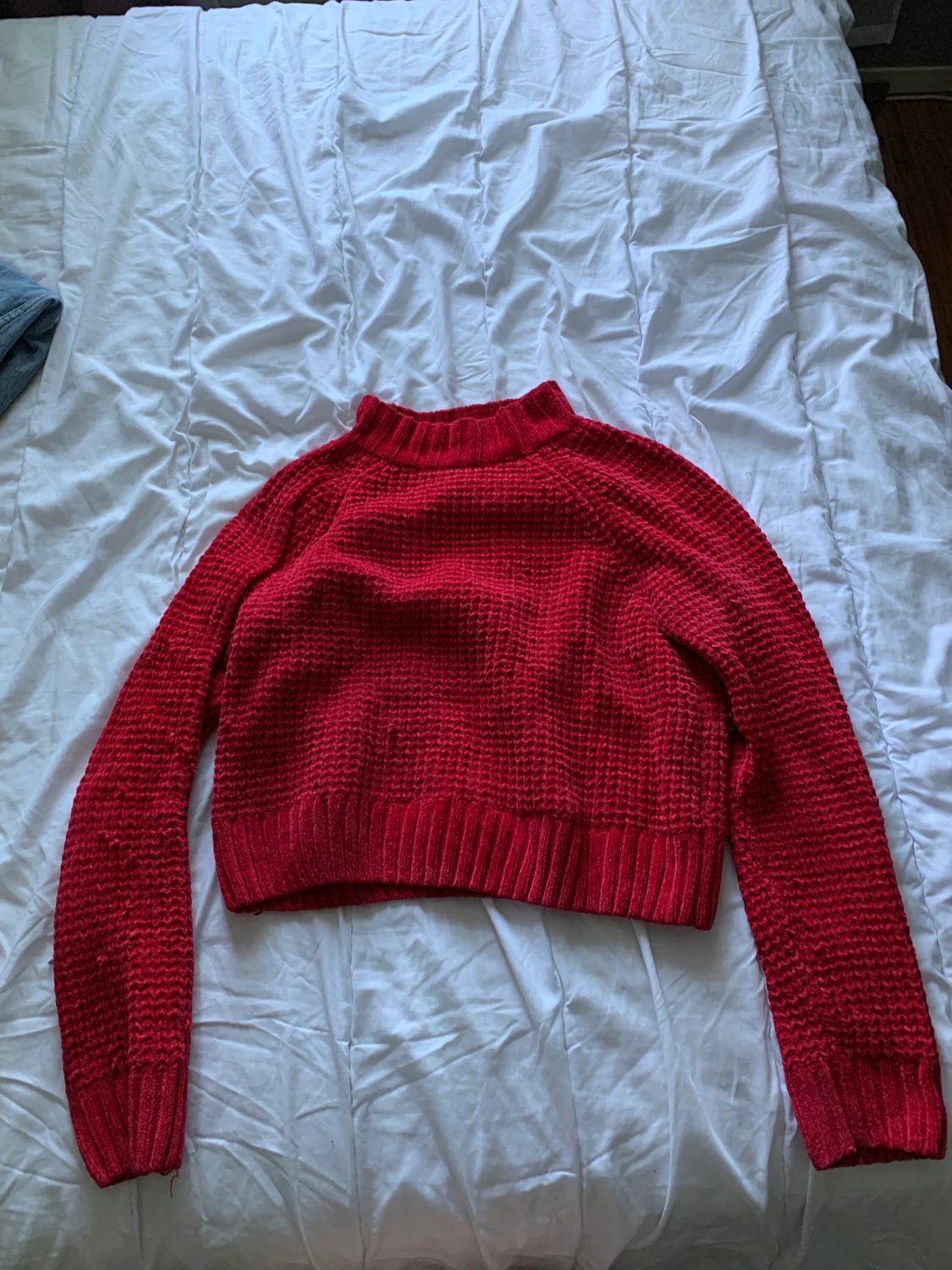 Stickad, röd tröja