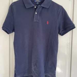 Polo Ralph Lauren pické - Polo pické i ungdomstorlek L(14-16) för ca 160cm. Andvänd men verkligen inget fel på.