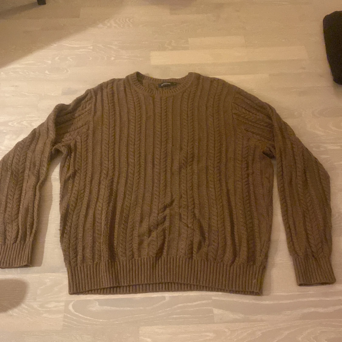 kabelstickad tröja