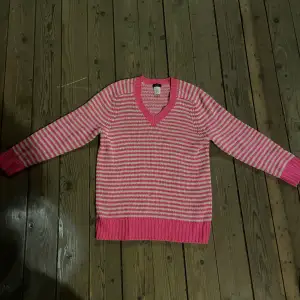 Randig rosa tröja med 3/4 armar st S/m 