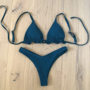 Blågrön bikini - Söt blågrön bikini som aldrig kommit till användning 