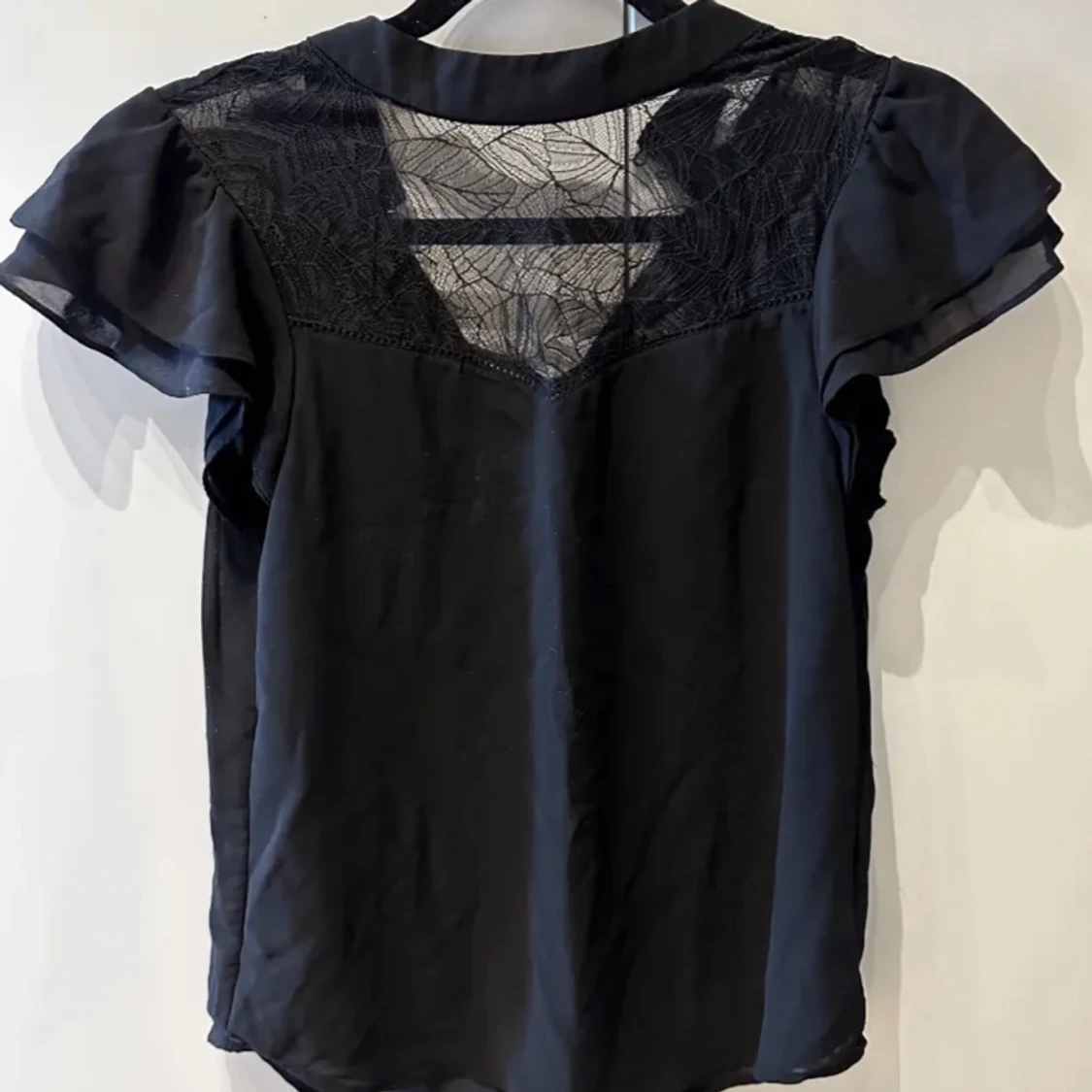 Svart spets topp