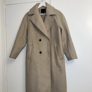 Beige kappa - Kappa från lager 157 strl xs. Knappt använd 