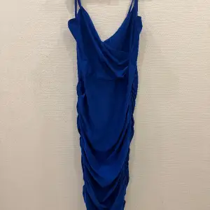 Beautiful royal blue bodycon dress perfect for summertime!  I’m perfect condition, not used!  Brand: AX Paris 