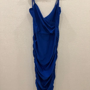 Blue ruched bodycon dress - Beautiful royal blue bodycon dress perfect for summertime!  I’m perfect condition, not used!  Brand: AX Paris 