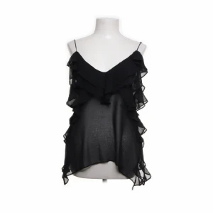 Linne från ZARA  - Volang linne från ZARA. Oanvänd. Denna är i xs men jag bär vanligtvis s/m i toppar och denna passar mig bra. Skulle säga att den passar allt från xs-m beroende på hur man vill att linnet ska sitta. 