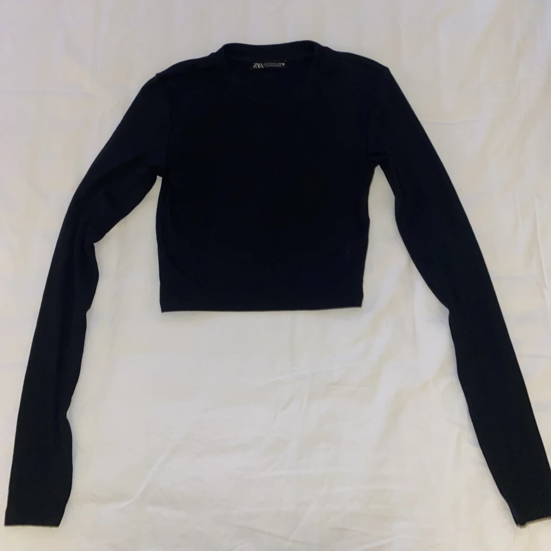 Svart Långärmad magtröja