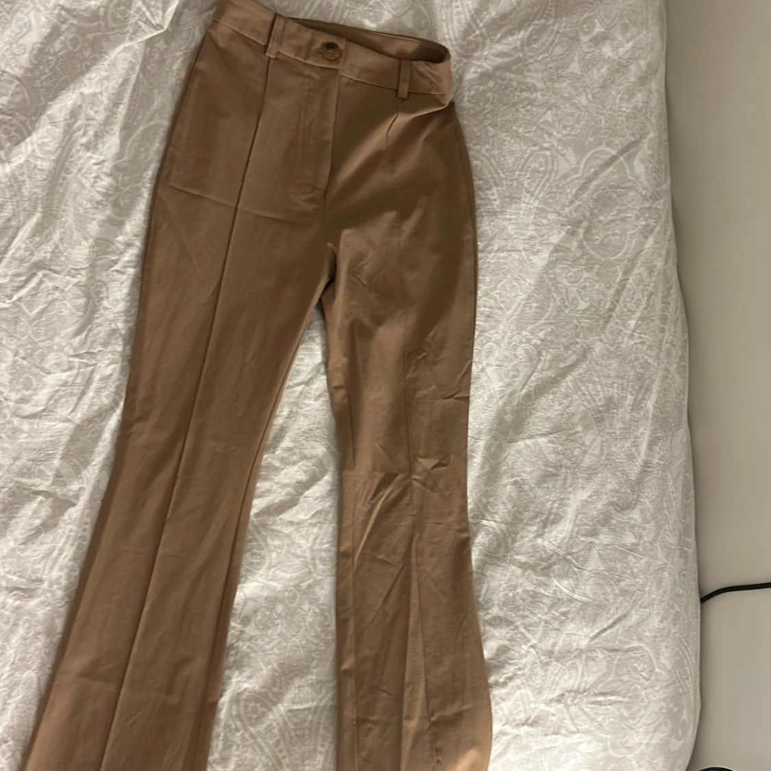 Kostym byxor, brun färg,