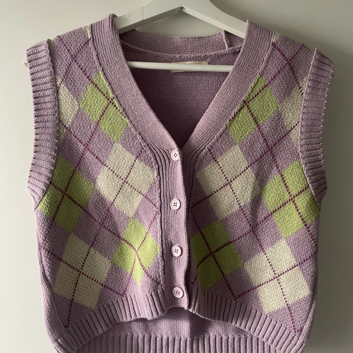 Lila grön väst