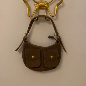 Axelväska - Axelväska från brandy Melville. Köpt för typ 1-2 år sedan men nyskick! 
