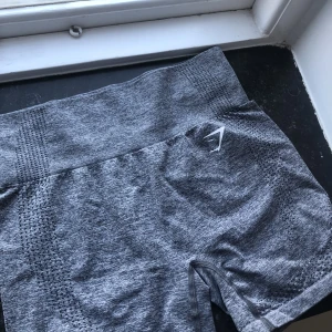 Gymshark shorts  - Grå gymshark shorts i storlek M. 
