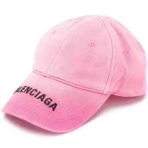 Balenciaga Cap in Fuchsia   Brand new with tags Original receipt  Size L Color Sunfaded fuchsia/pink  • Cotton material • Adjustable Velcro tab at back • Balenciaga logo embroidered on the front • Ventilation eyelets embroidered on top • Made in Italy