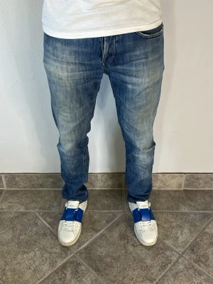Dondup George Jeans - CONDITION — 9/10 Excellent condition.  Light signs of wear.     SIZE — 33 Model is 170 cm, 67kg  MEASUREMENTS (CM) (Please refer to the last photo for measurement guide)  A — 42 cm  B — 96 cm  C — 16 cm
