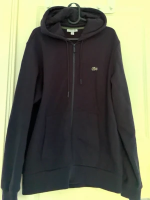 Lacoste zip  - Fin Lacoste tröja i size L