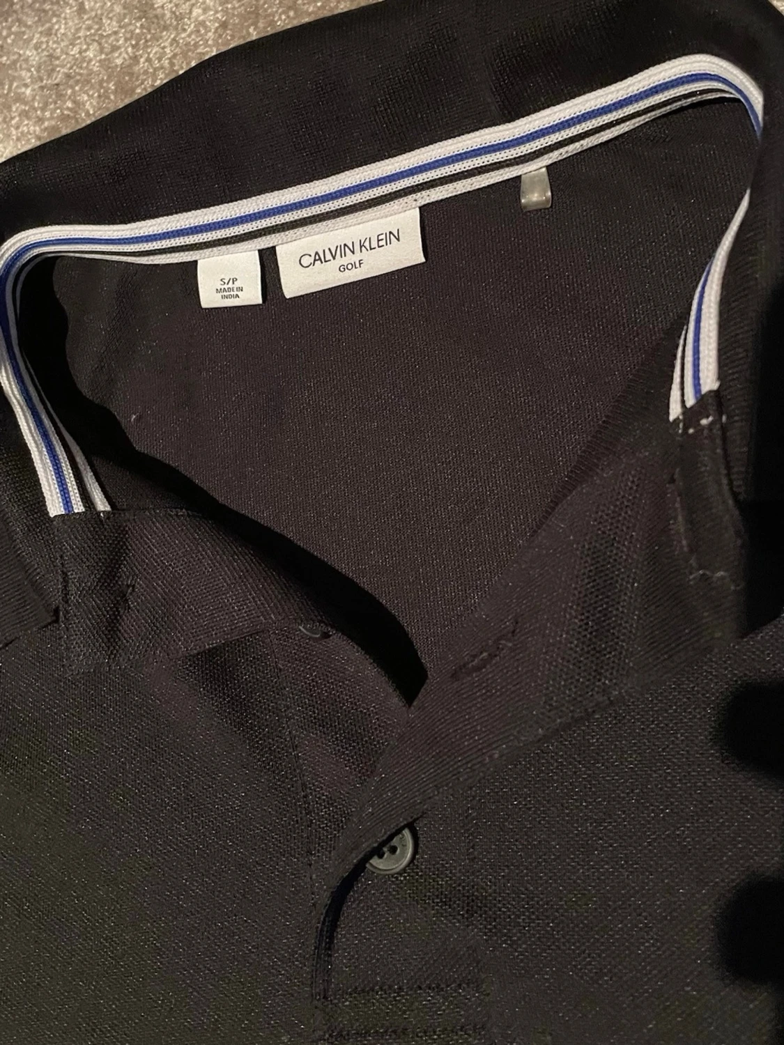 Svart pikétröja från Calvin Klein - 1