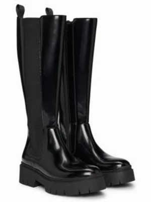 HUGO BOSS black winter boots  - Perfect condition. I only wore them one time , they are almost brand new. Selling them as they don’t fit me . Imitation leather , original price 2899 sek