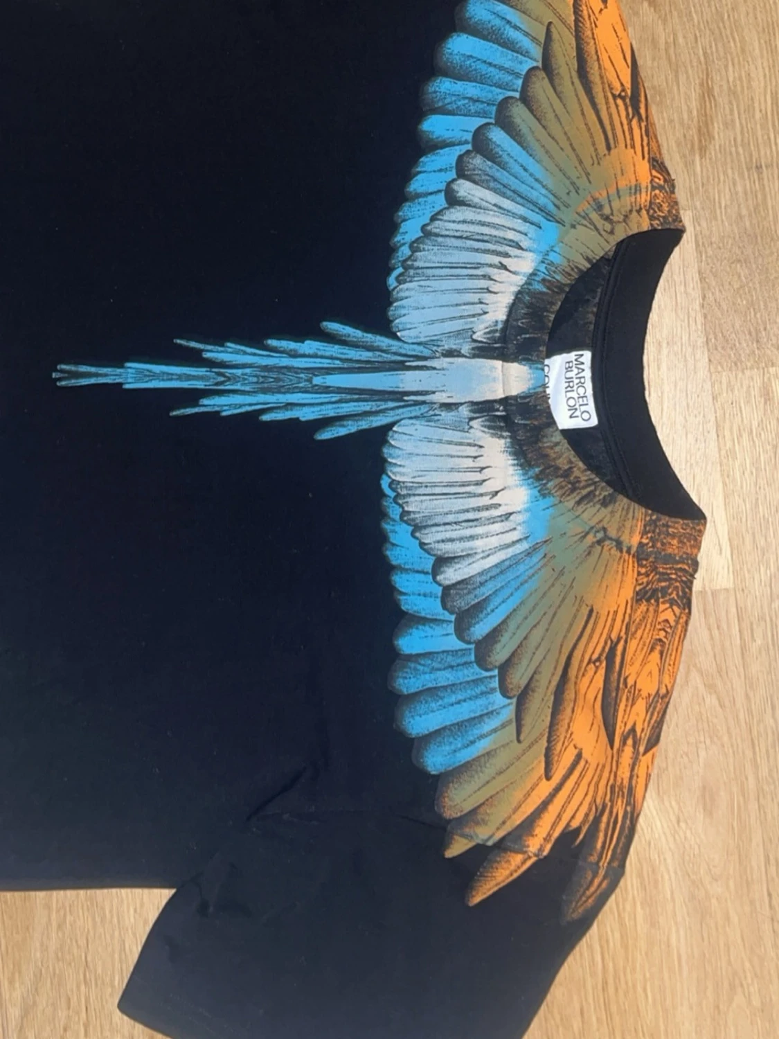 Svart t-shirt med färgglad fågelprint - 1
