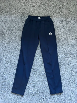 Sergio Tacchini tracksuit byxor  - Storlek Xs, mycket bra skick!