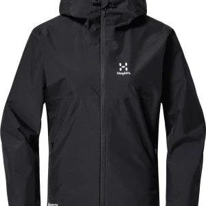 Svart vindjacka från Haglöfs - Snygg och funktionell svart vindjacka från Haglöfs med dragkedja och huva. Perfekt för utomhusaktiviteter med sin stilrena design och praktiska fickor. Jackan har långa ärmar och är tillverkad i slitstarkt material.