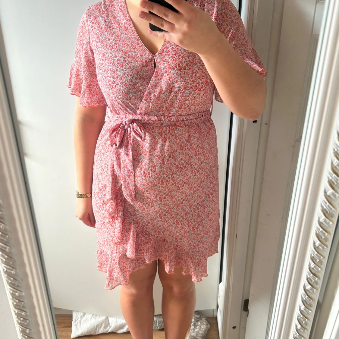 Rosa blommig klänning