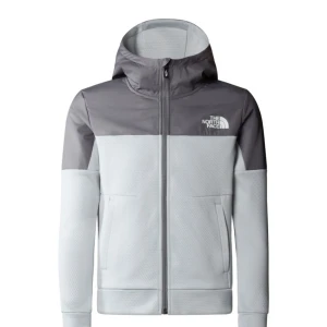 Grå vindset från The North Face - Snygg grå vindjset från The North Face med huva och hel dragkedja. Jackan har två sidofickor och logga på bröstet. Tillverkad i polyester med en sportig look, perfekt för dig som gillar en clean och modern stil.