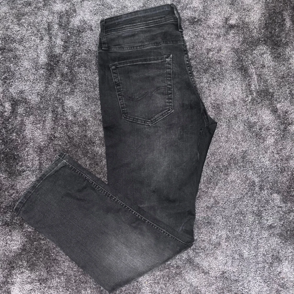 Svarta slitna jeans Jack and Jones