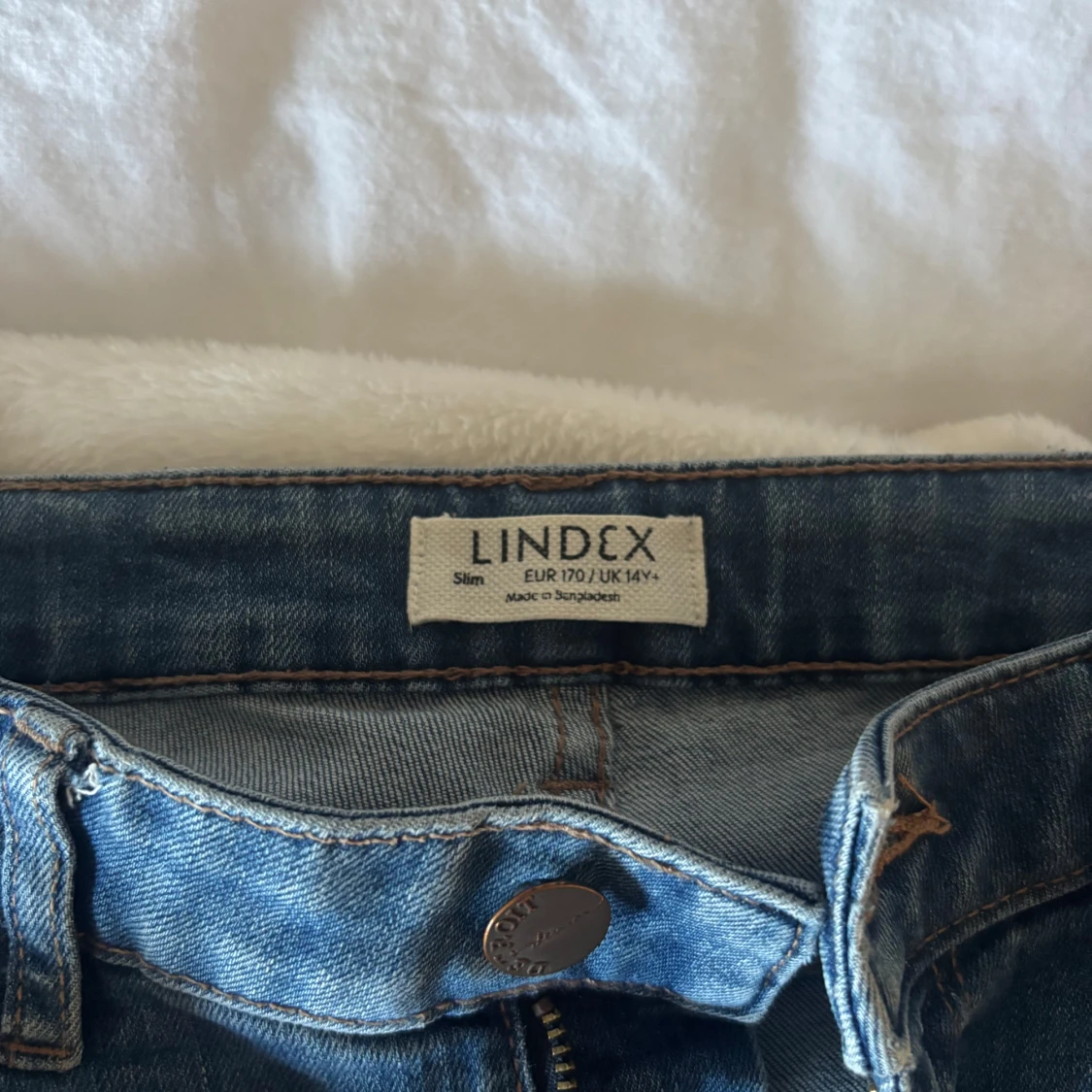 Blå bootcut jeans från Lindex - 2