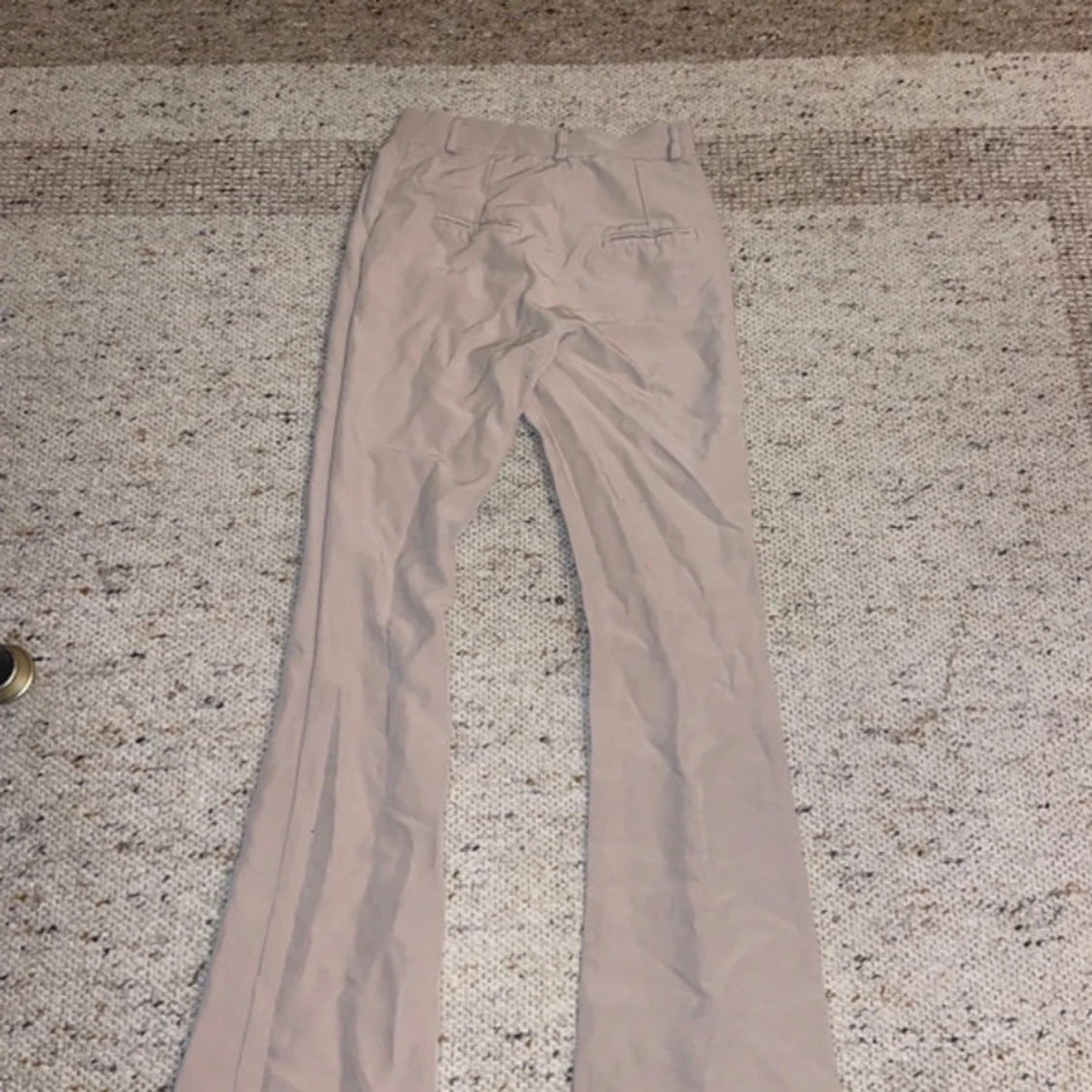 Beige bootcutbyxor från Design by Si - 2