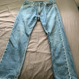 Levi's 551z blå jeans straight fit 29 30 - Klassiska Levi's 501 jeans i blå färg har haft 1 år men har växt ut