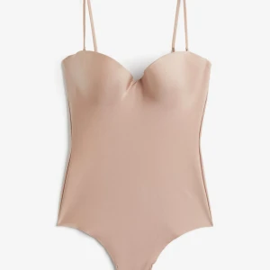 Beige  body - Så fin beige body från Hm! Storlek 75A i kupan! Aldrig använd!