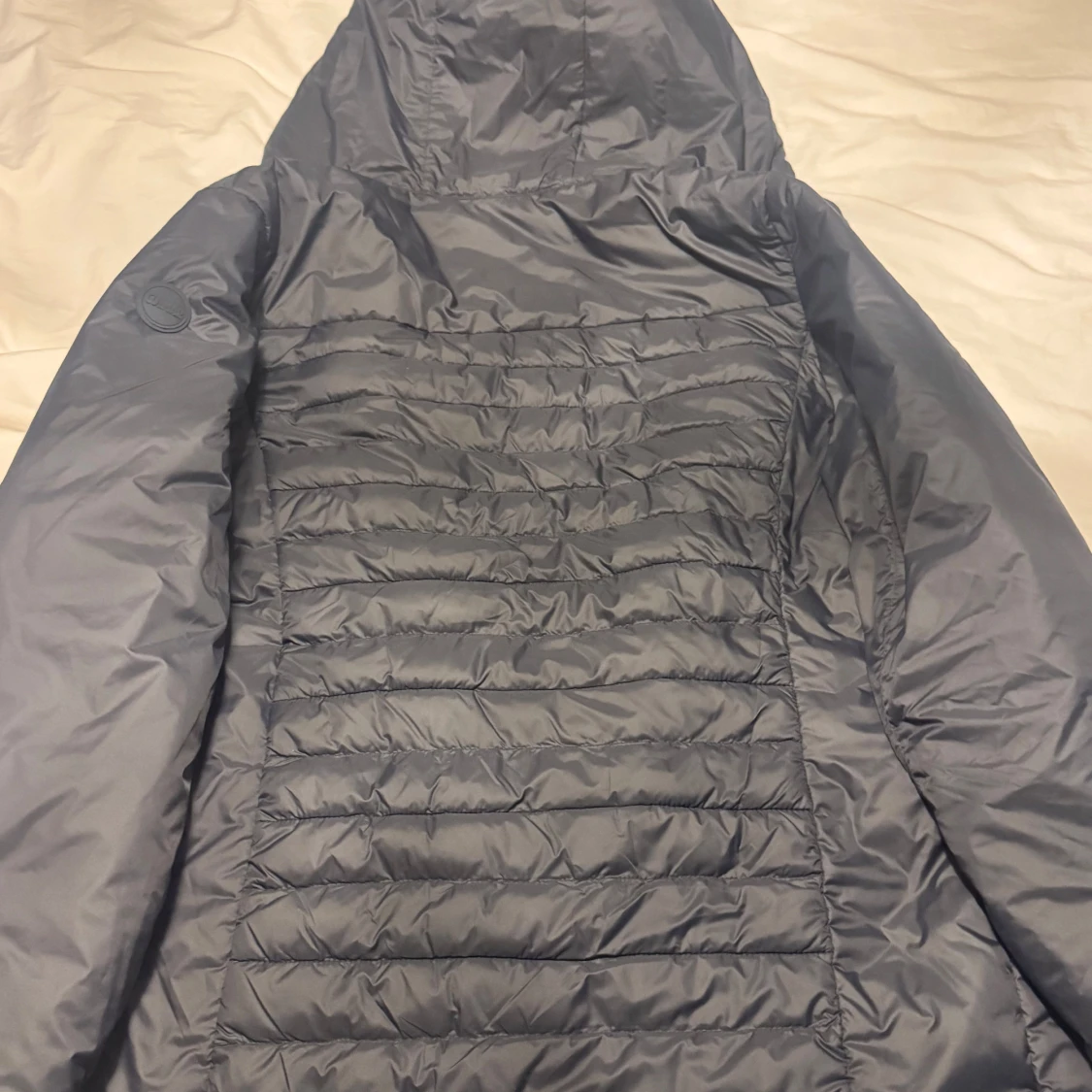 Mörkblå Colmar pufferjacka med huva - 1