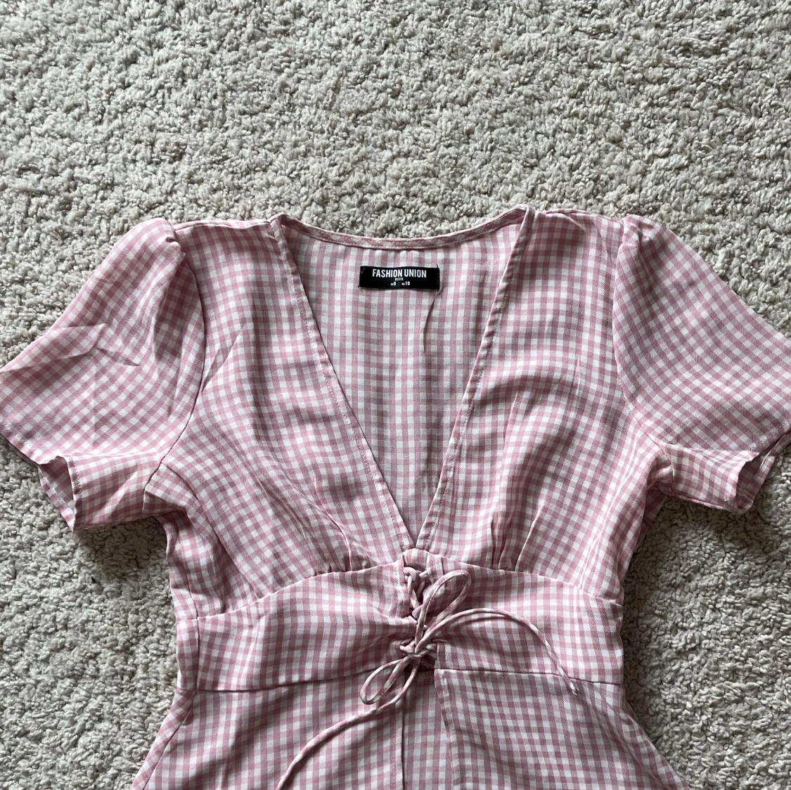 Rosa rutig blus med knytning - 1