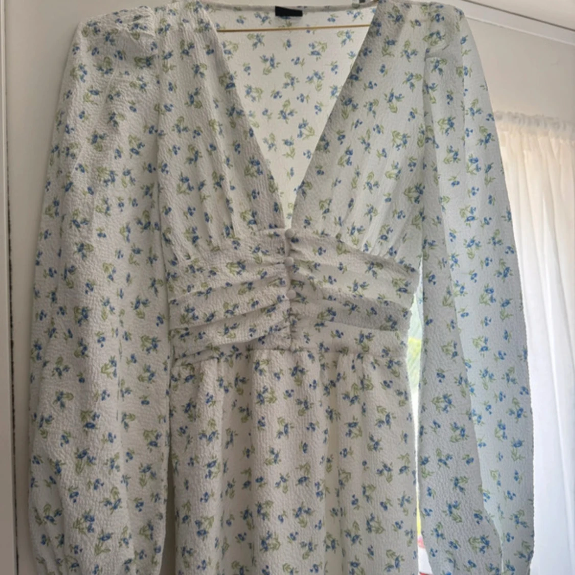 Blommig långklänning från Gina Tricot