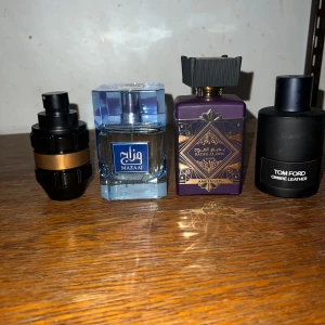 Fyra exklusiva parfymer mix - Säljes  1500  tom ford ombre leather parfum edp 100ml ca 65ml kvar 900kr  bade'e al oud amethyst 100ml ca 95ml kvar 150kr  viktor & rolf spicebomb extreme 50 ml ca 45ml kvar 450kr  zimaya mazaaj infused 100ml edp bara test sprayad 200kr   Paketpris 1500kr