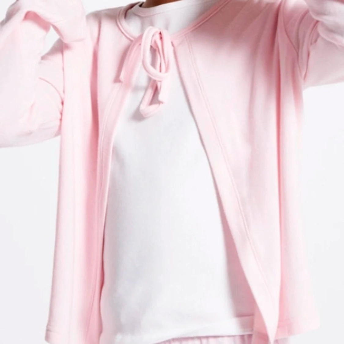 Ljusrosa kofta från 157