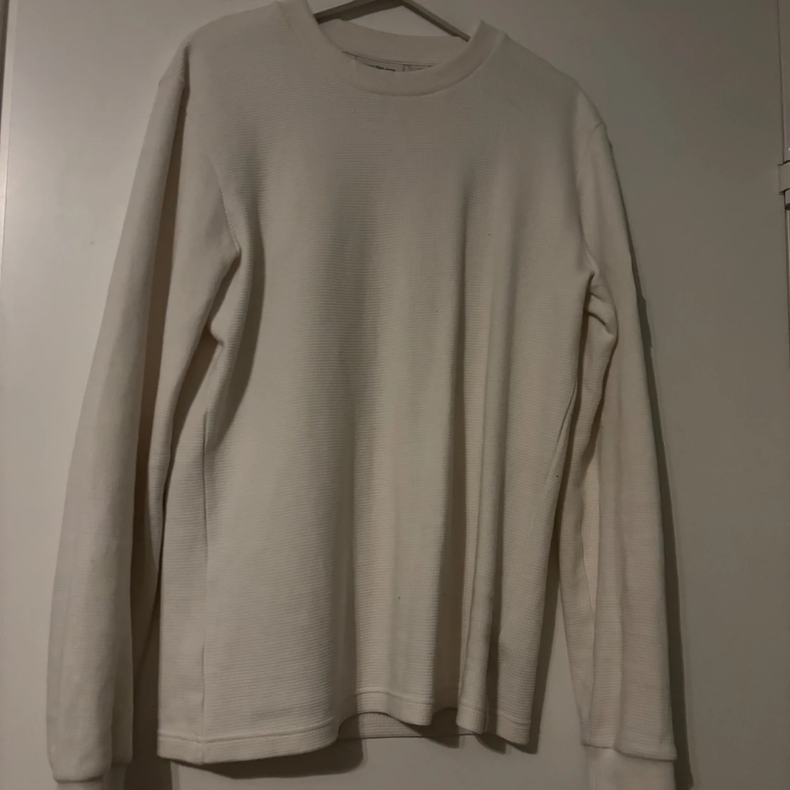 Vit långärmad tröja från Calvin Klein Jeans