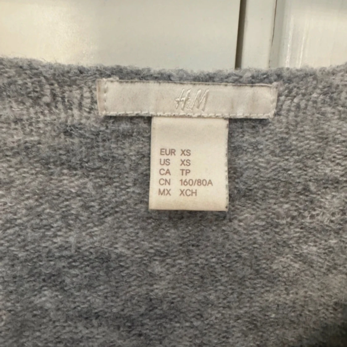 Grå stickad tröja från H&M - 1