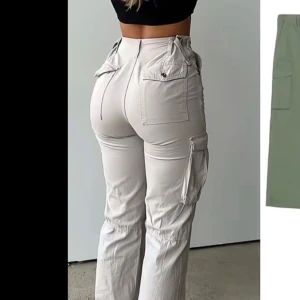 Cargo pants - Säljer superfina virala cargo pantsen💕de sitter så snyggt eftersom man kan dra åt och anpassa midjestorleken😍bara använda 2 gånger då jag känner att de är lite korta på mig som är ganska lång
