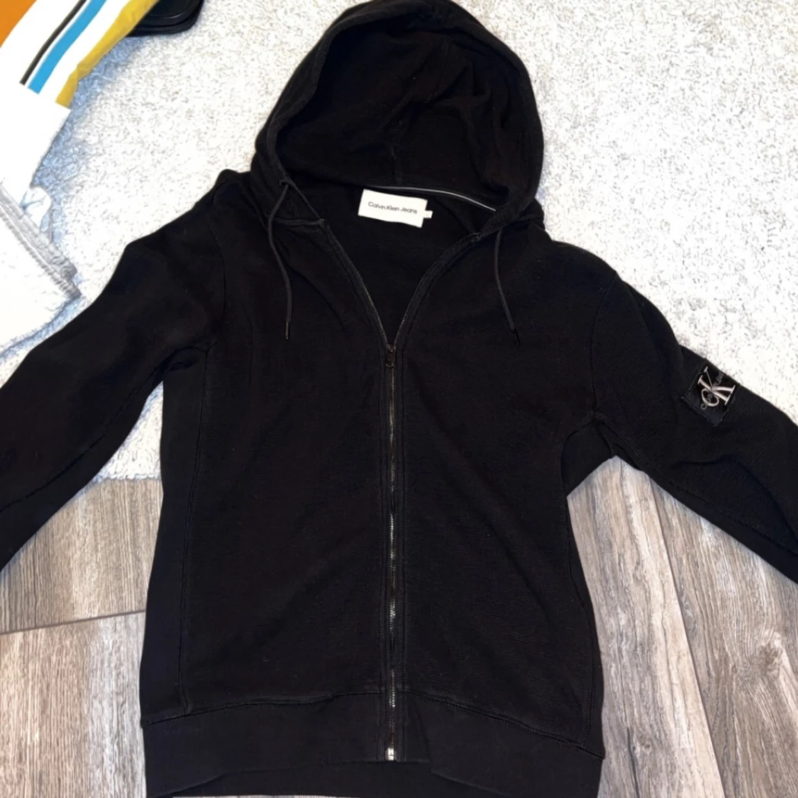 Svart kofta från Calvin Klein Jeans