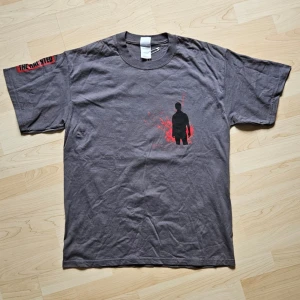 The Haunted 2008 - Vintage Tee - Band T-Shirt - The Haunted 2008  Mycket fint skick!  Storlek: L  100% Bomull   Axelbredd: 52cm  Längd: 73cm