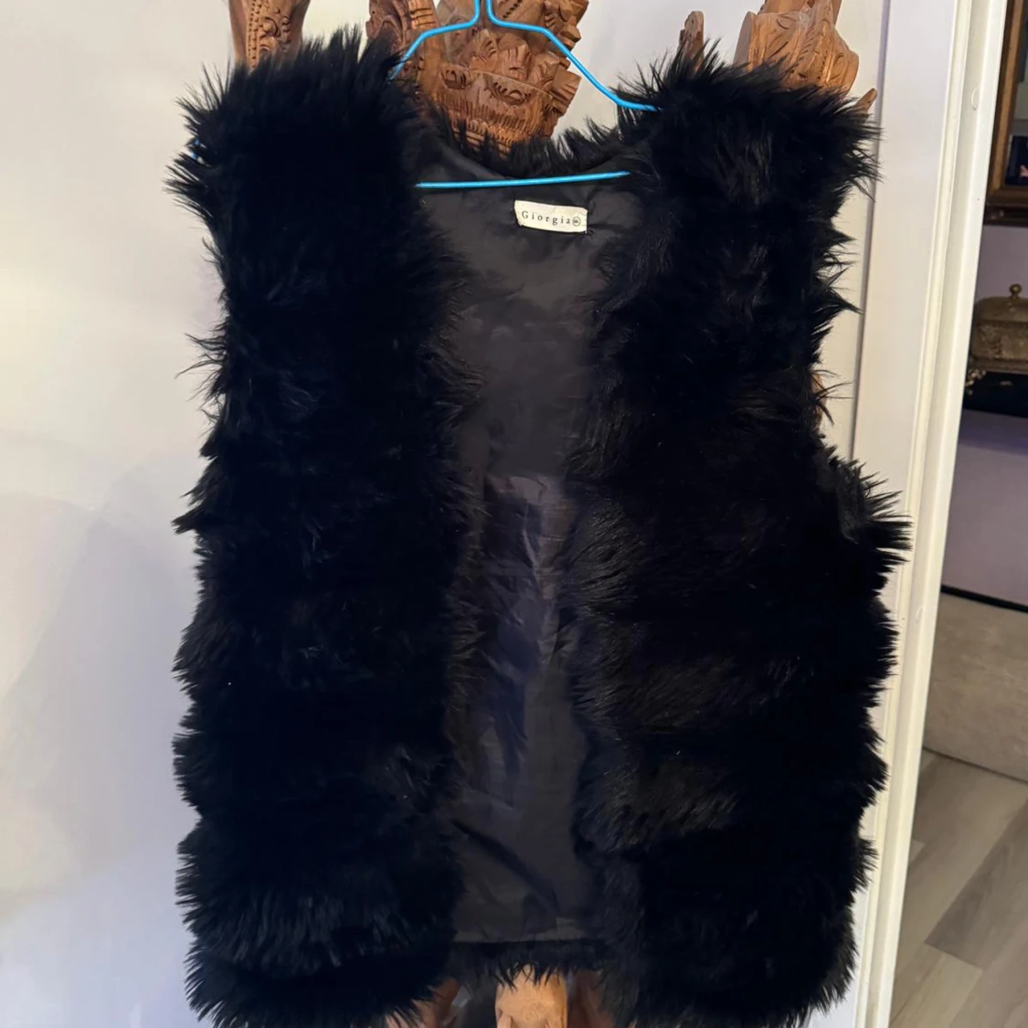 Svart pälsväst från Giorgia, strl 38