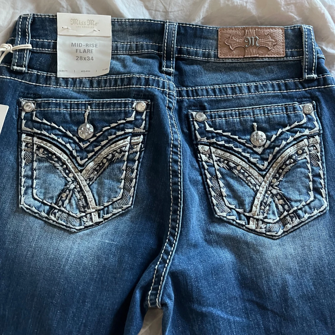 mid-rise flare miss me jeans