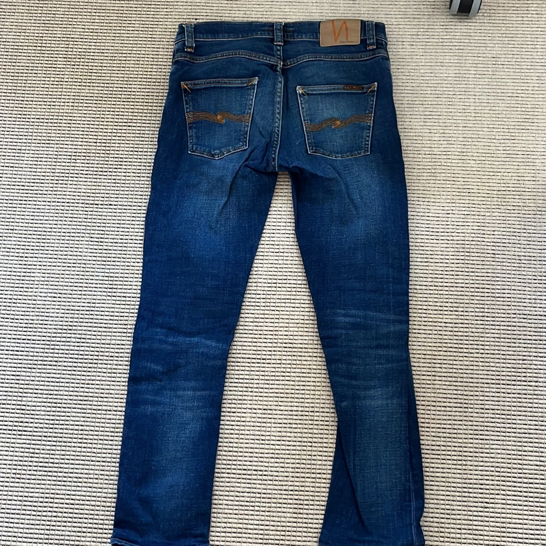 Blå jeans från Nudie Jeans Grim Tim 28W 32L