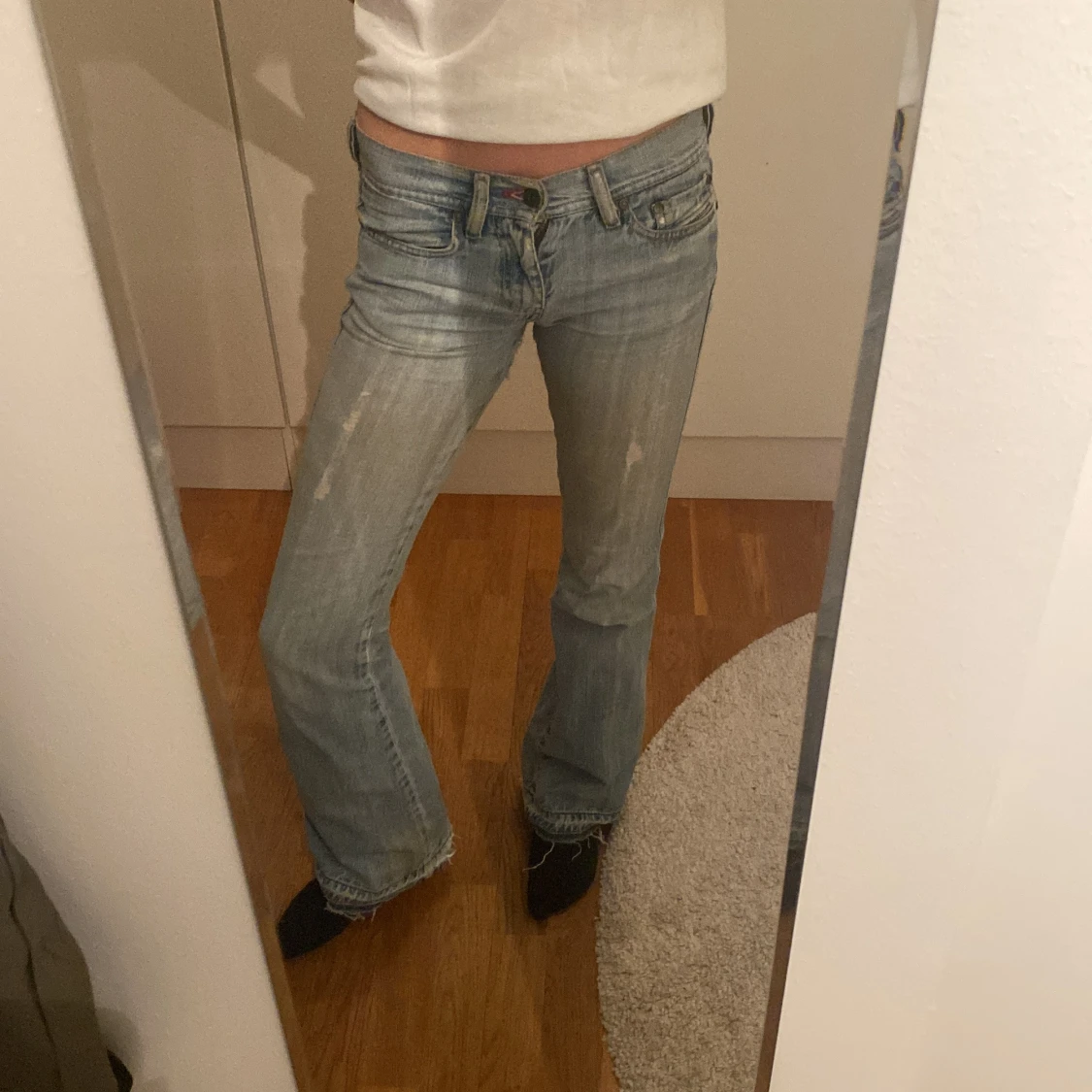 Ljusblå bootcut jeans